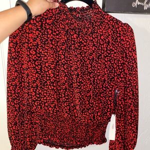 Red and black cheetah print blouse
